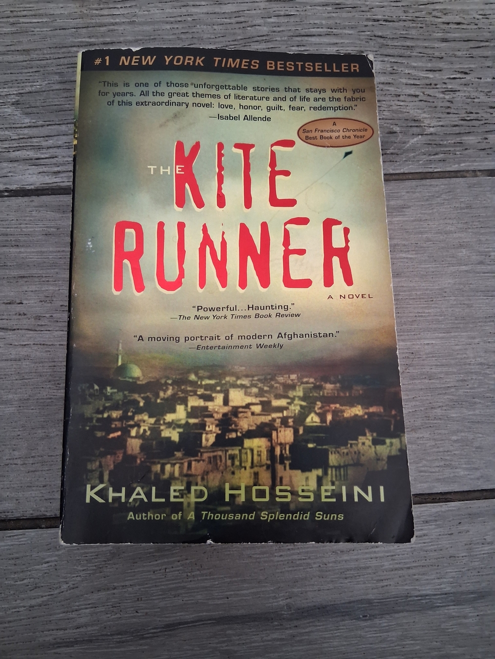 The Kite Runner by Khaled Hosseini - Paperback with Green and Cream Cover